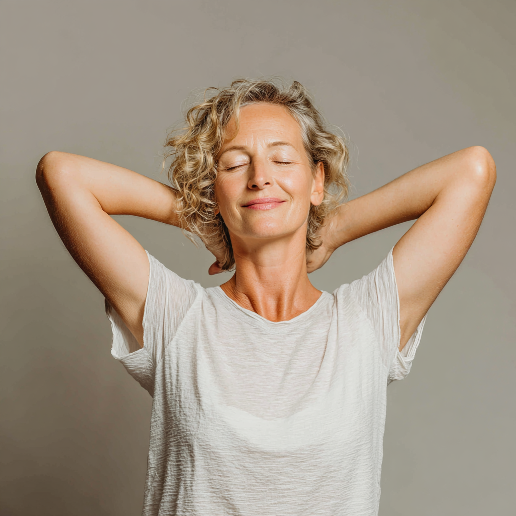 Middle-aged person demonstrating holistic body care approach with natural movements
